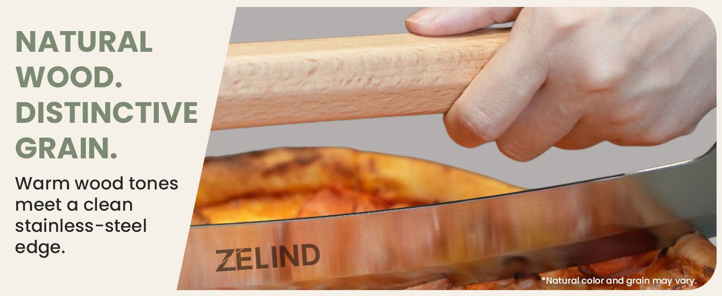 Close-up of the pizza rocker’s wood handle and stainless-steel blade; natural grain may vary.